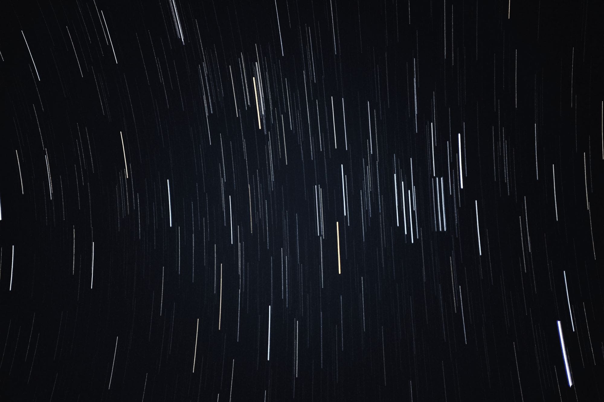 Captivating long-exposure shot of star trails, capturing the night sky's motion from Kollam, India.