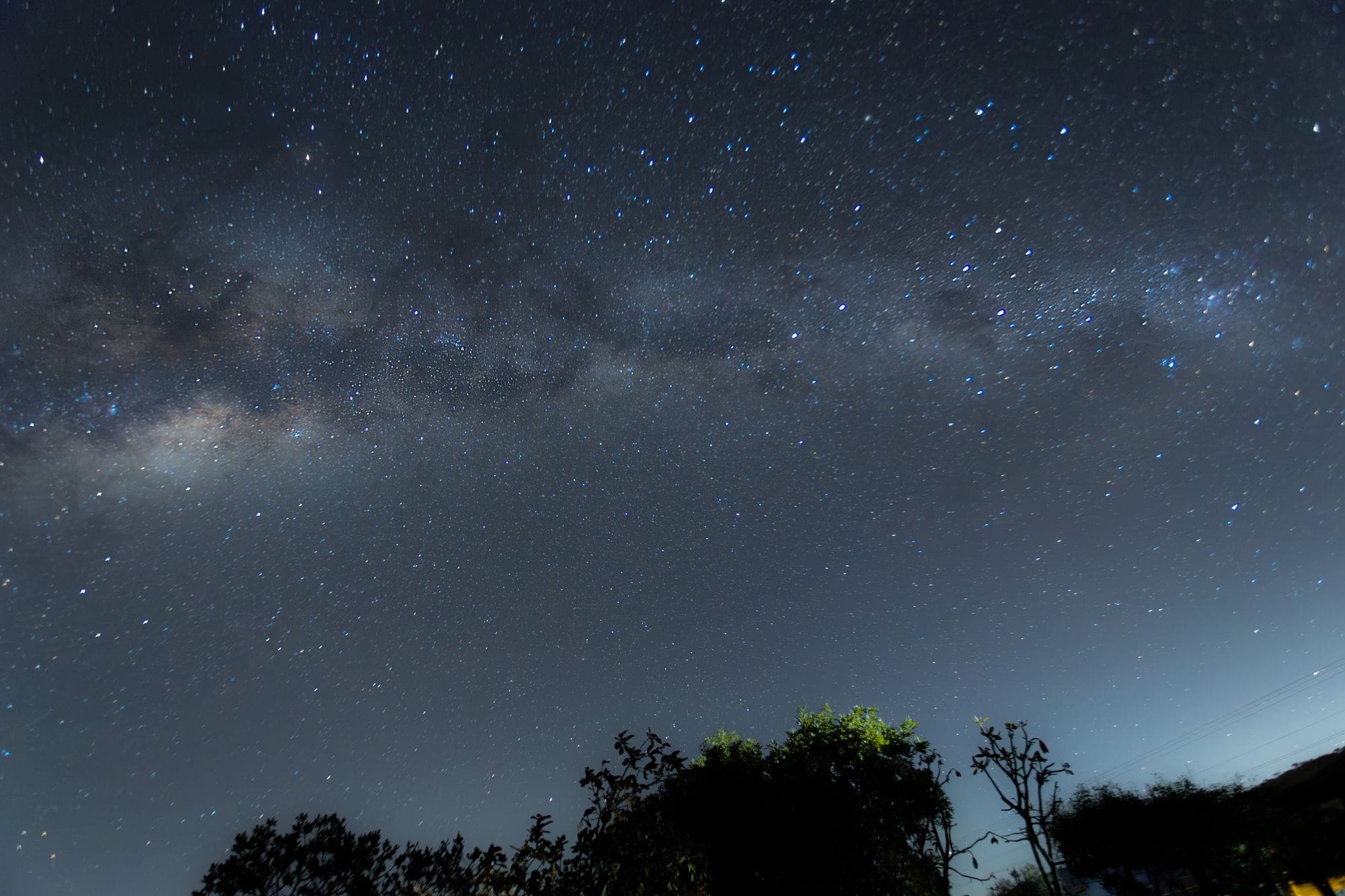 A breathtaking view of the Milky Way galaxy under a starry night sky.