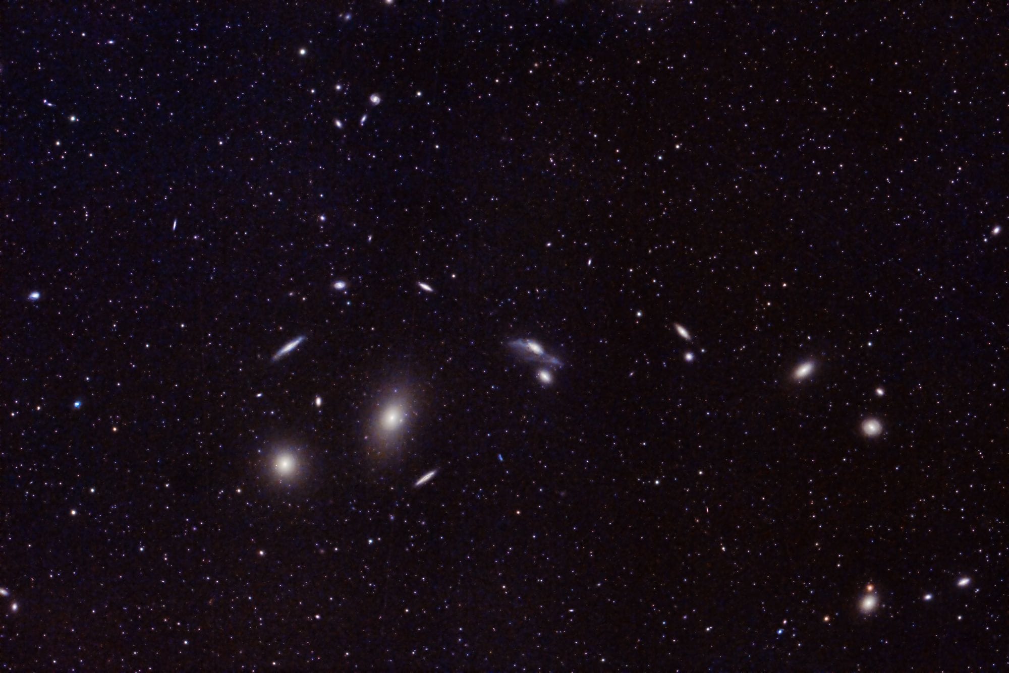 Captivating image of distant galaxies and star clusters in the vast universe. Perfect for astronomy enthusiasts.