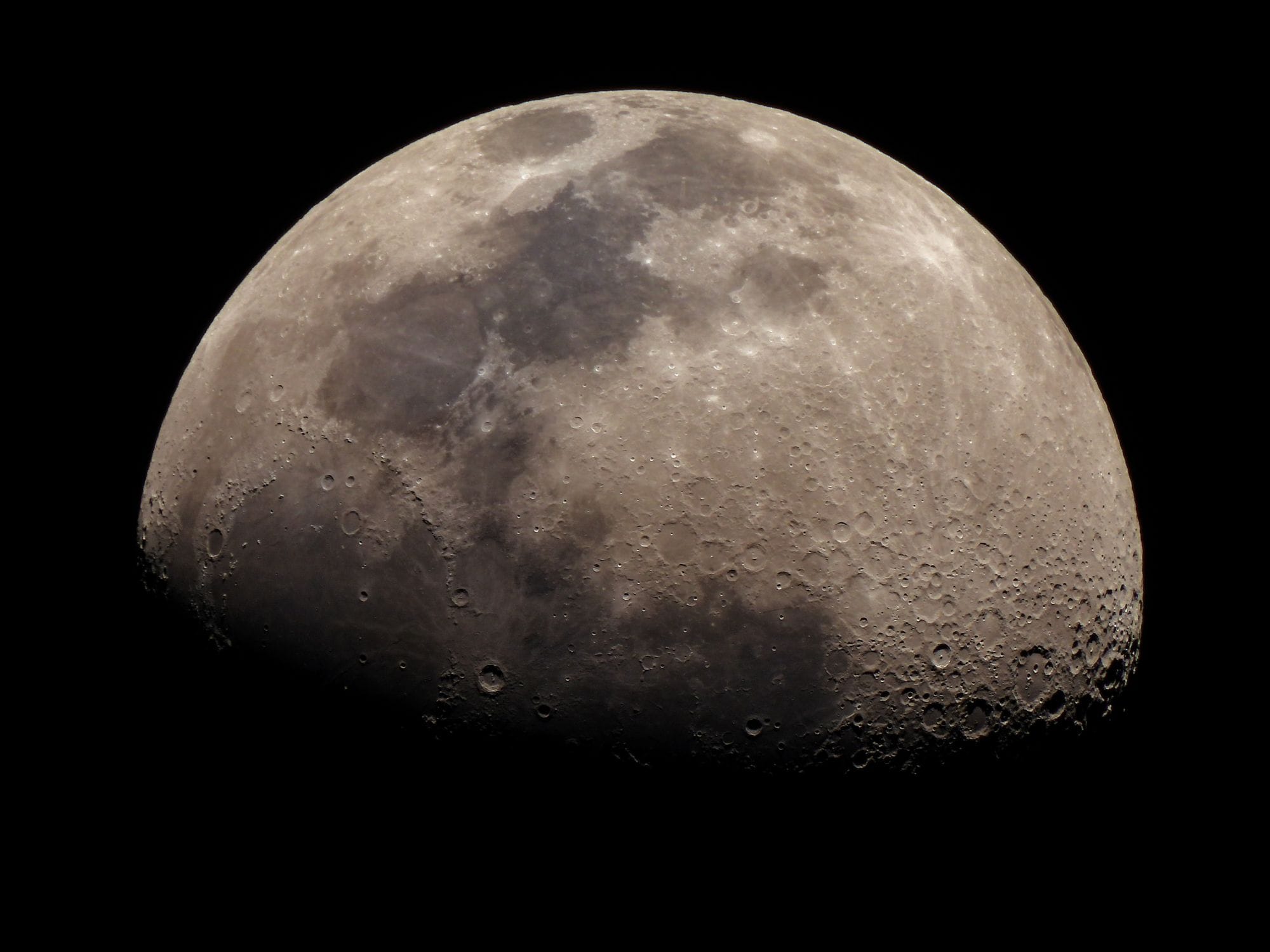 A detailed close-up of the moon showcasing its craters and surface texture.
