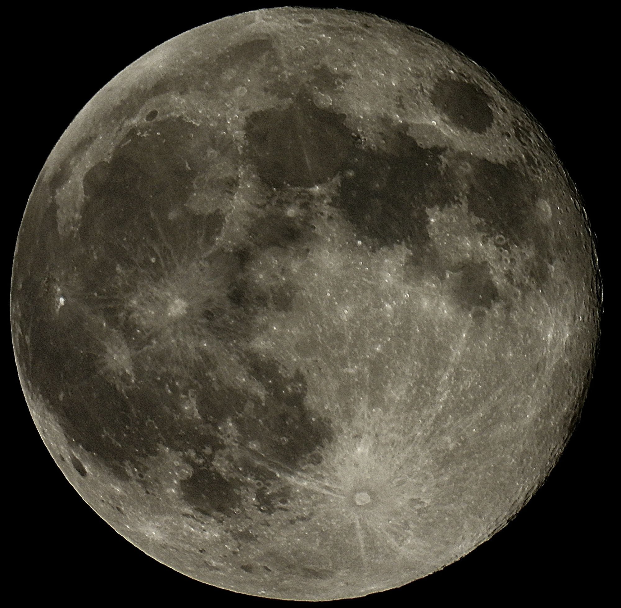 Detailed high-resolution image of the full moon against a dark sky.