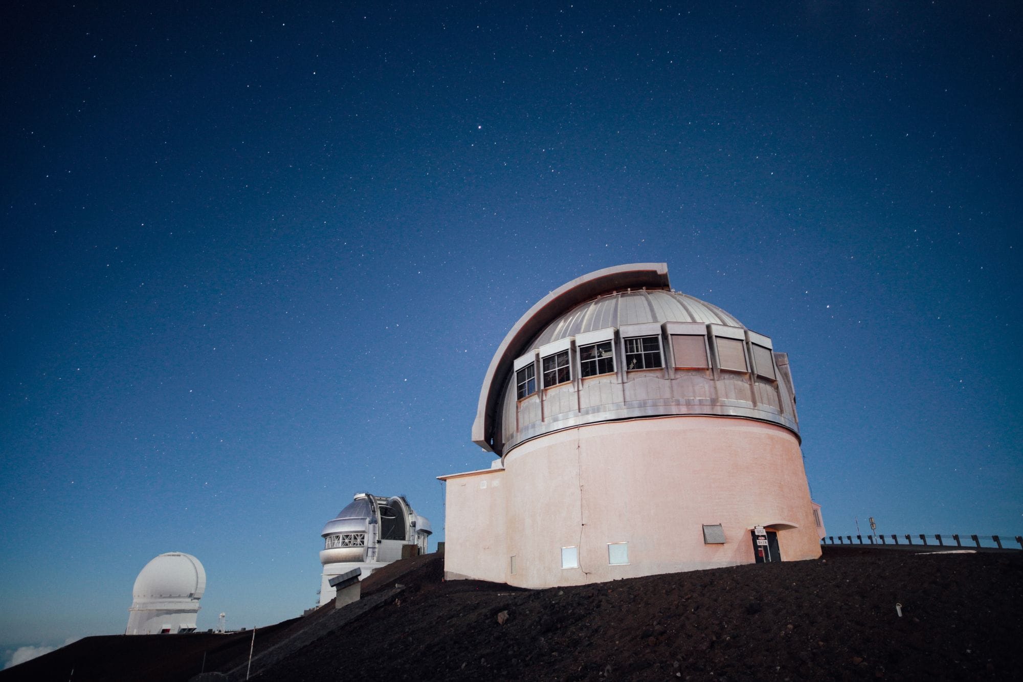 A stunning observatory under a clear, starry night sky, perfect for astronomy enthusiasts.