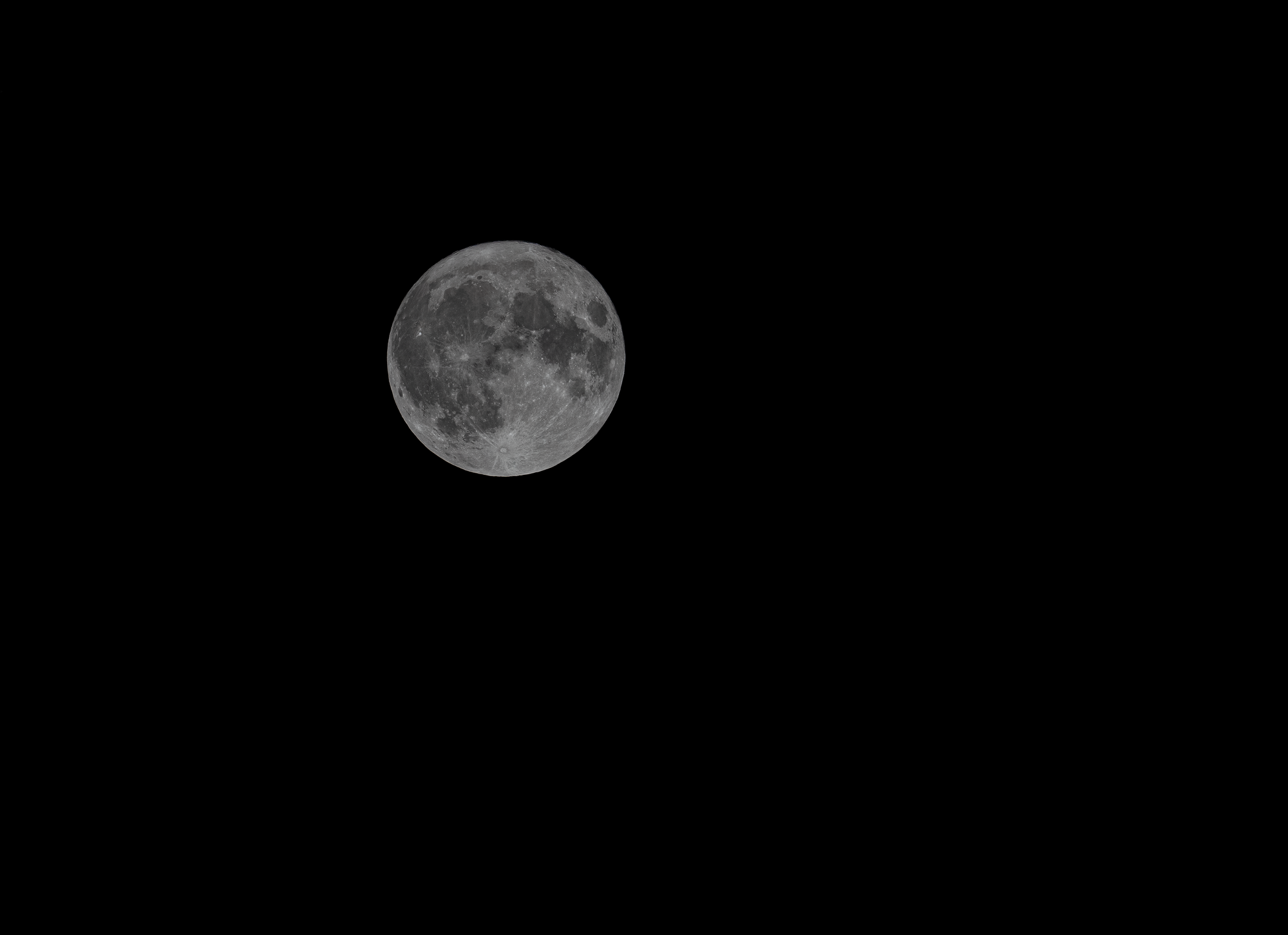 A detailed photograph of a full moon in the night sky, captured from Israel.
