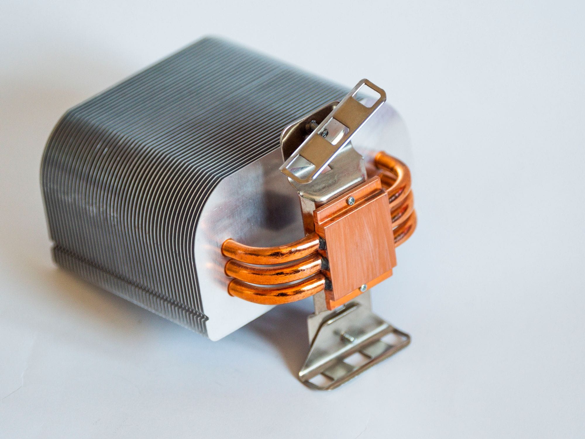 Detailed view of a metallic computer heatsink for cooling systems.