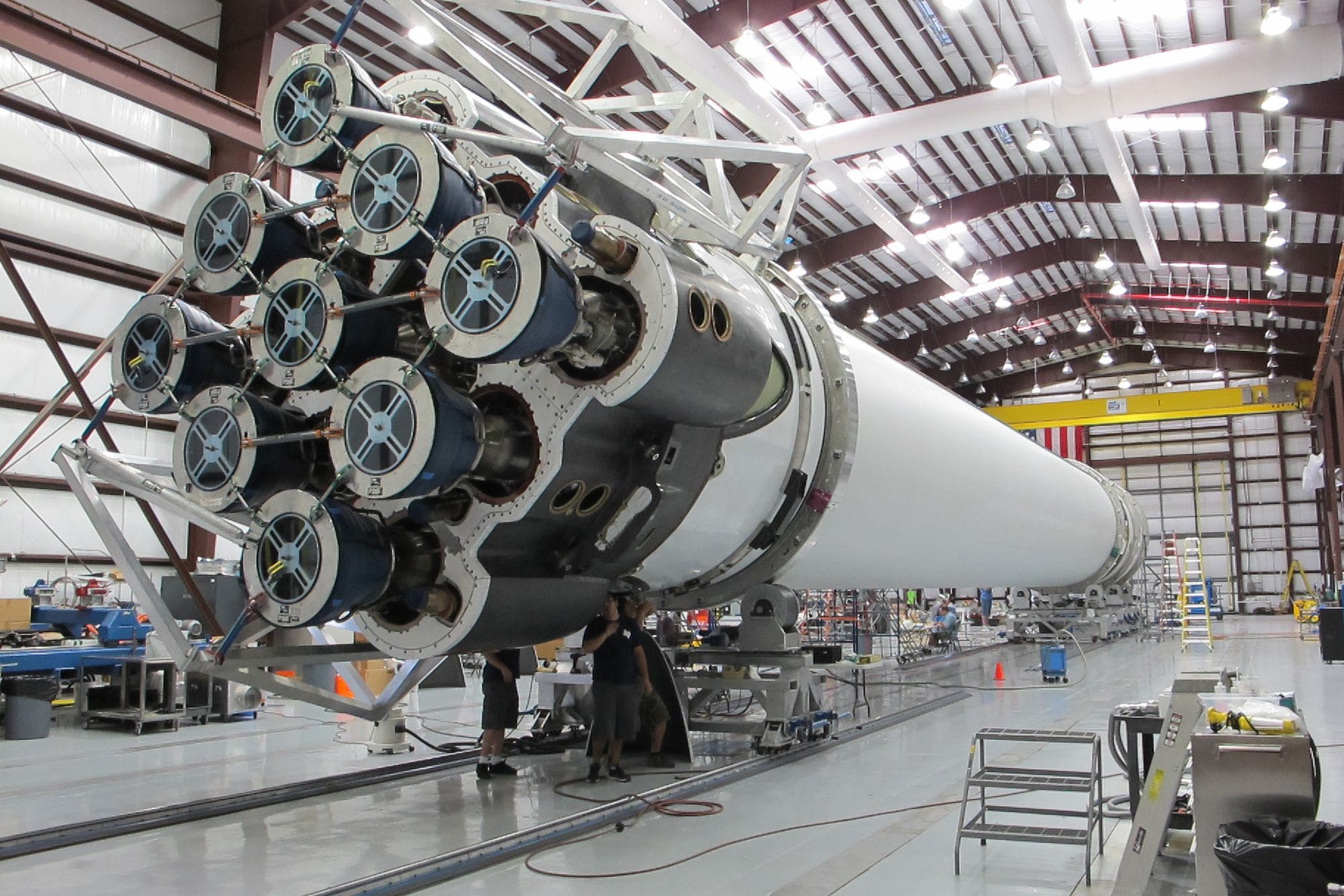Low angle of innovative rocket core detail under construction at modern futuristic industrial factory