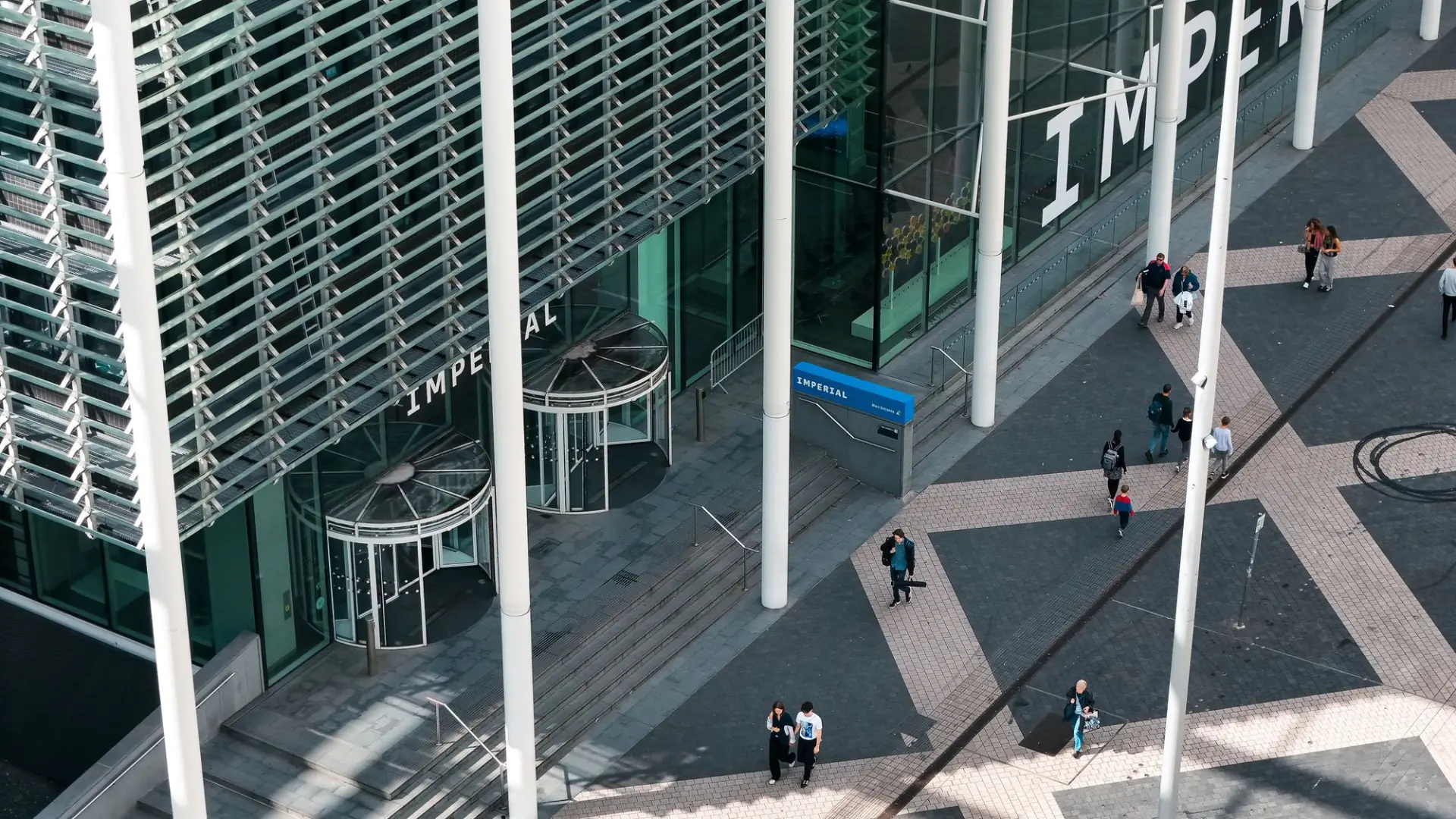 Aerial view of modern architecture and bustling city street in London, UK.