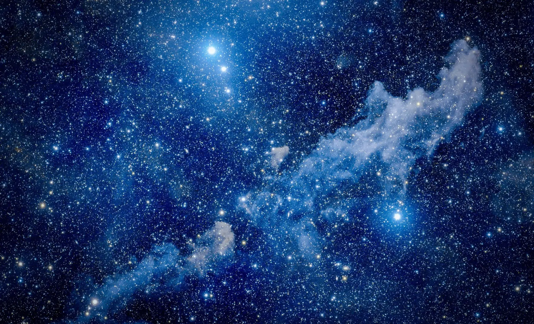 Breathtaking view of a starry sky with a majestic nebula in deep space.