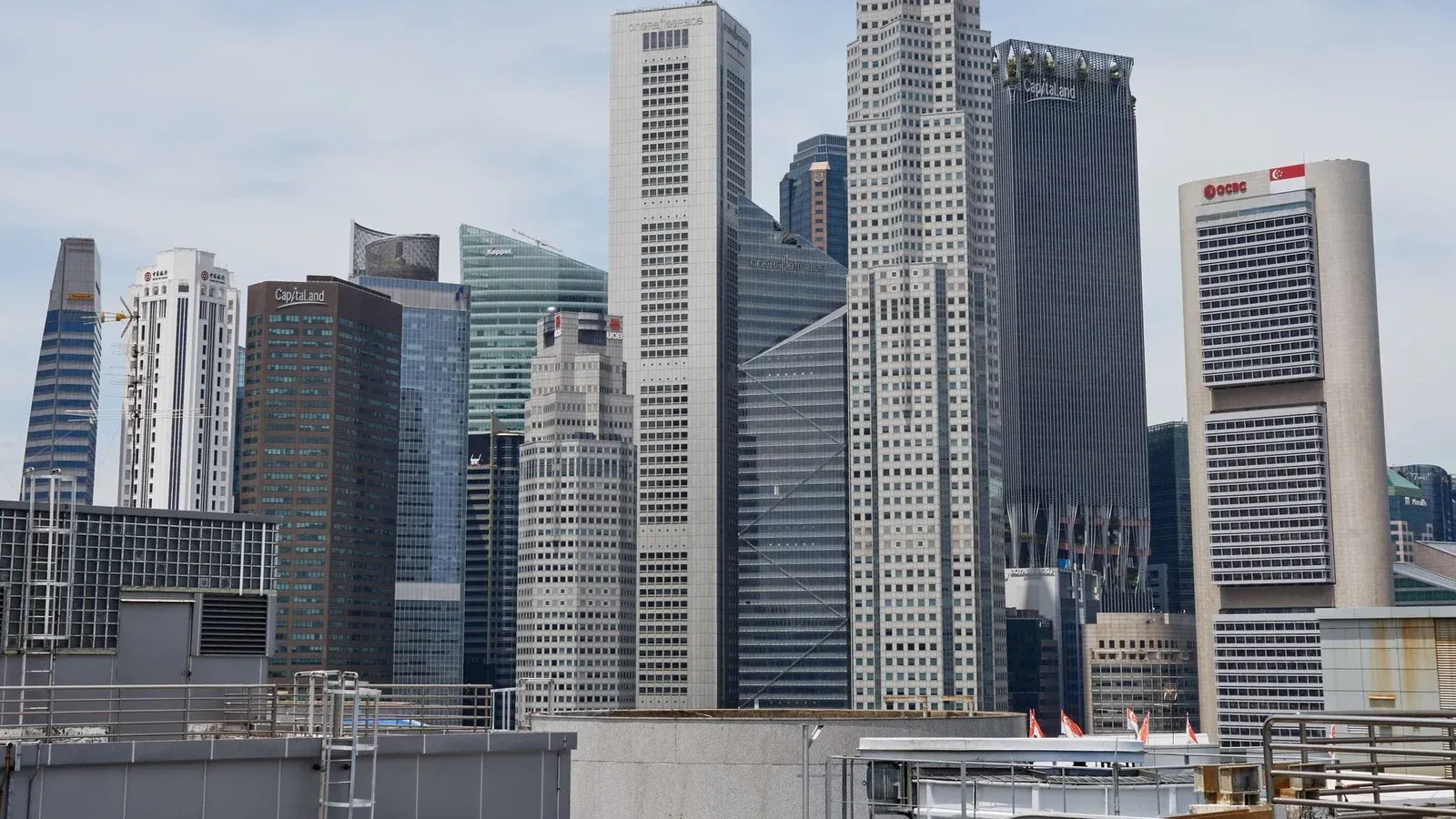 Stunning view of Singapore's modern skyline featuring iconic skyscrapers under a clear sky.