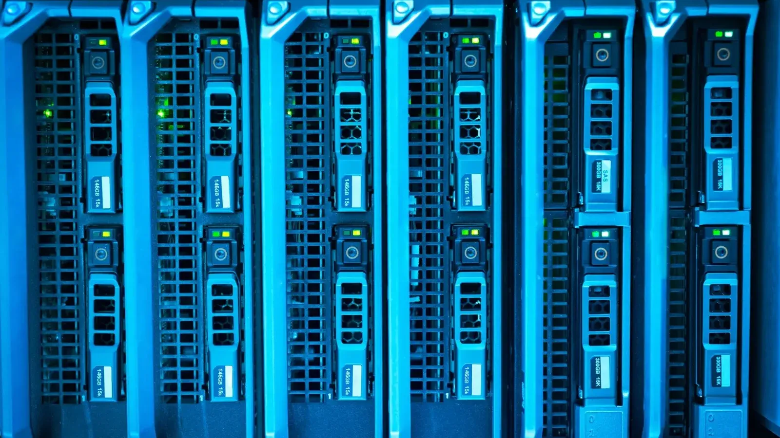 Detailed image of illuminated server racks showcasing modern technology infrastructure.