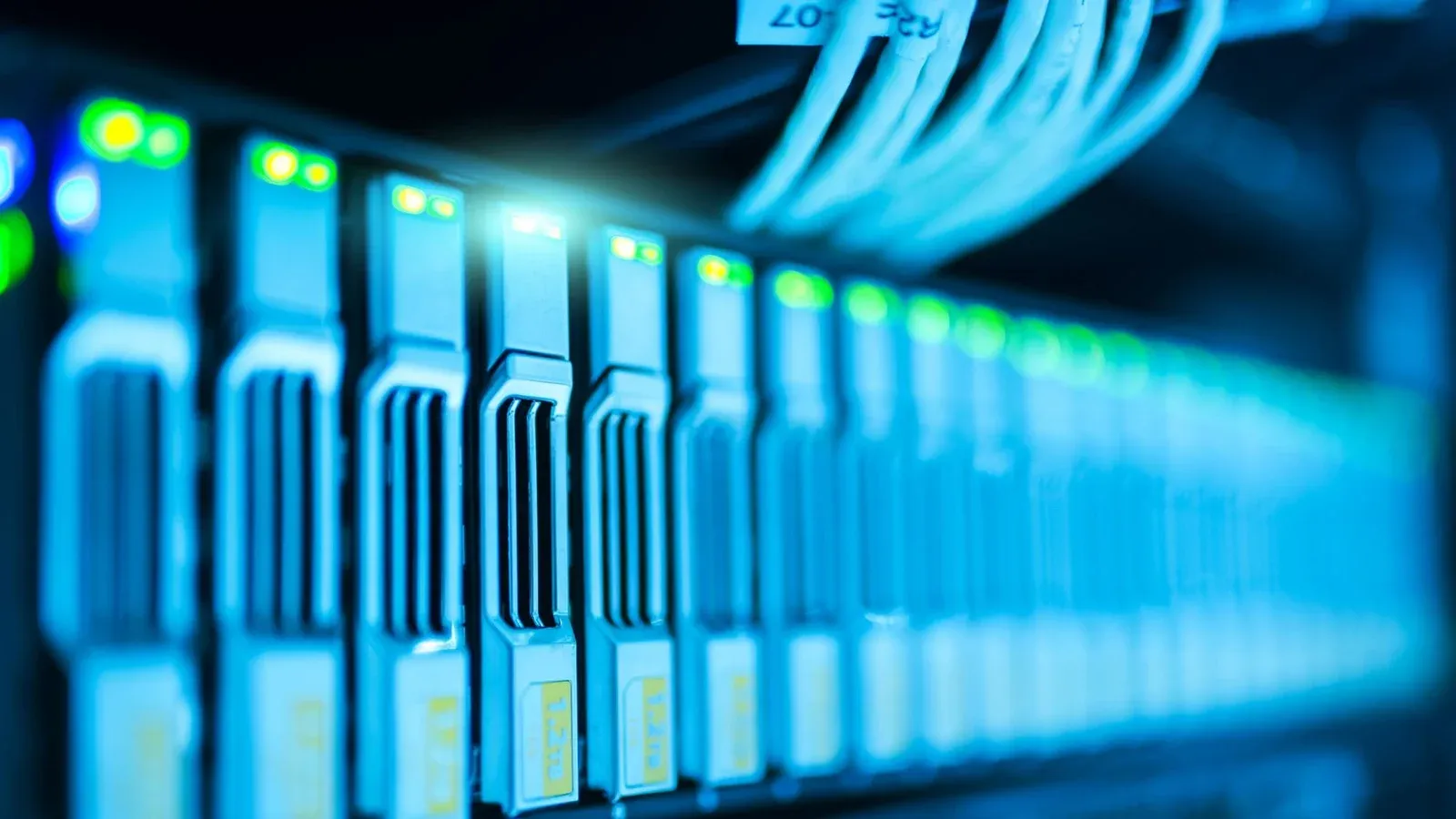 Detailed image of a server rack with glowing lights in a modern data center.