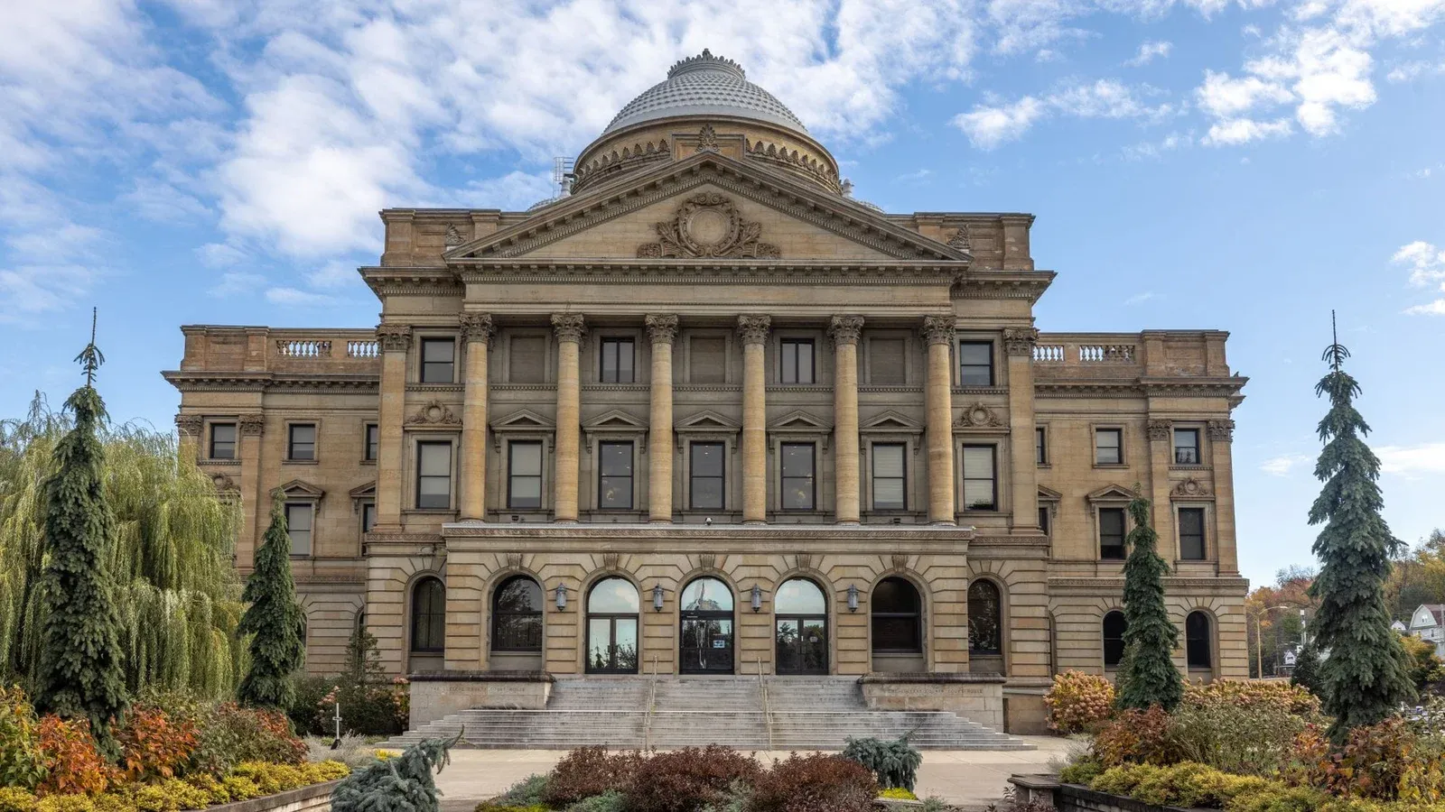 Front view of Luzerne County Courthouse, Wilkes-Barre, under a blue sky.