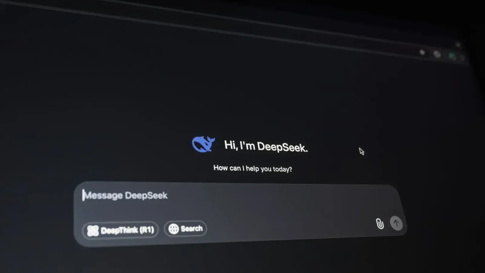 Close-up of a digital assistant interface on a dark screen, showcasing AI technology communication.