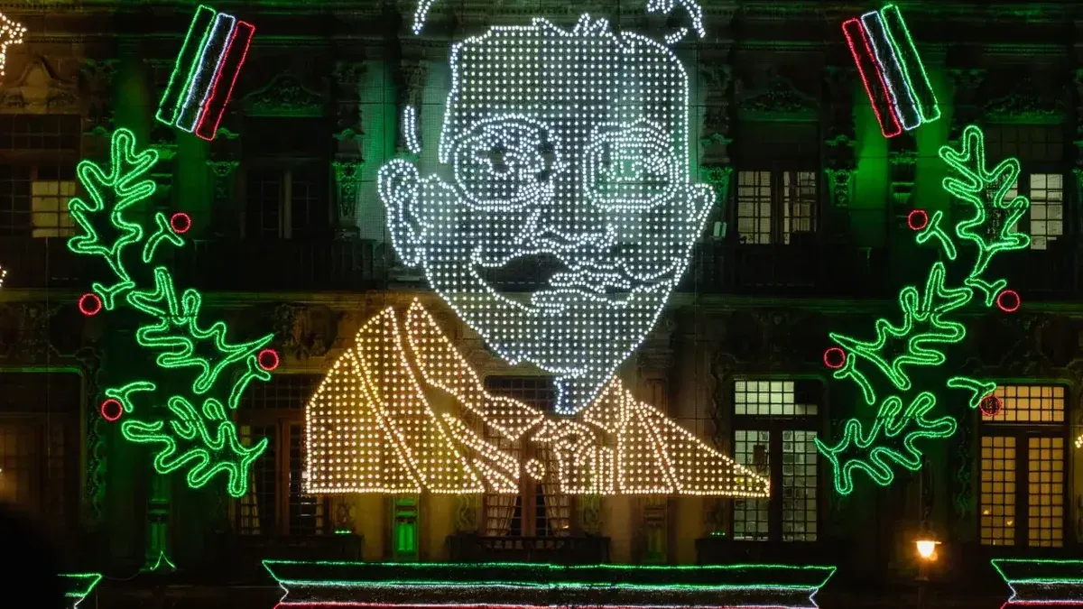 Illuminated LED display celebrating Mexico's Independence Day in Mexico City at night.