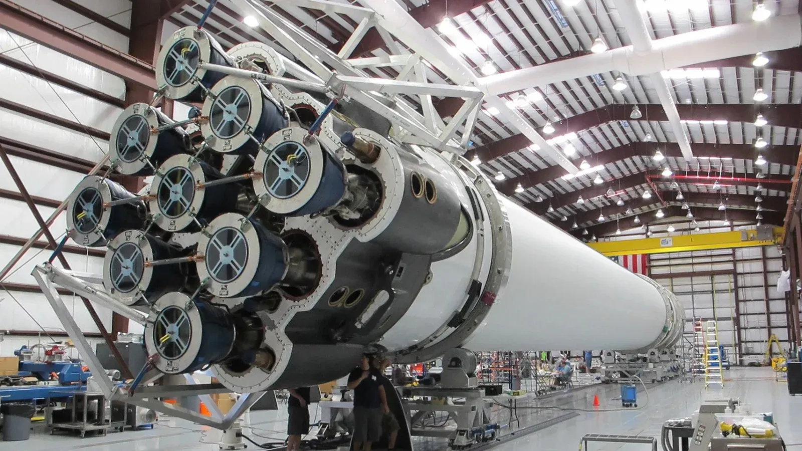 Low angle of innovative rocket core detail under construction at modern futuristic industrial factory