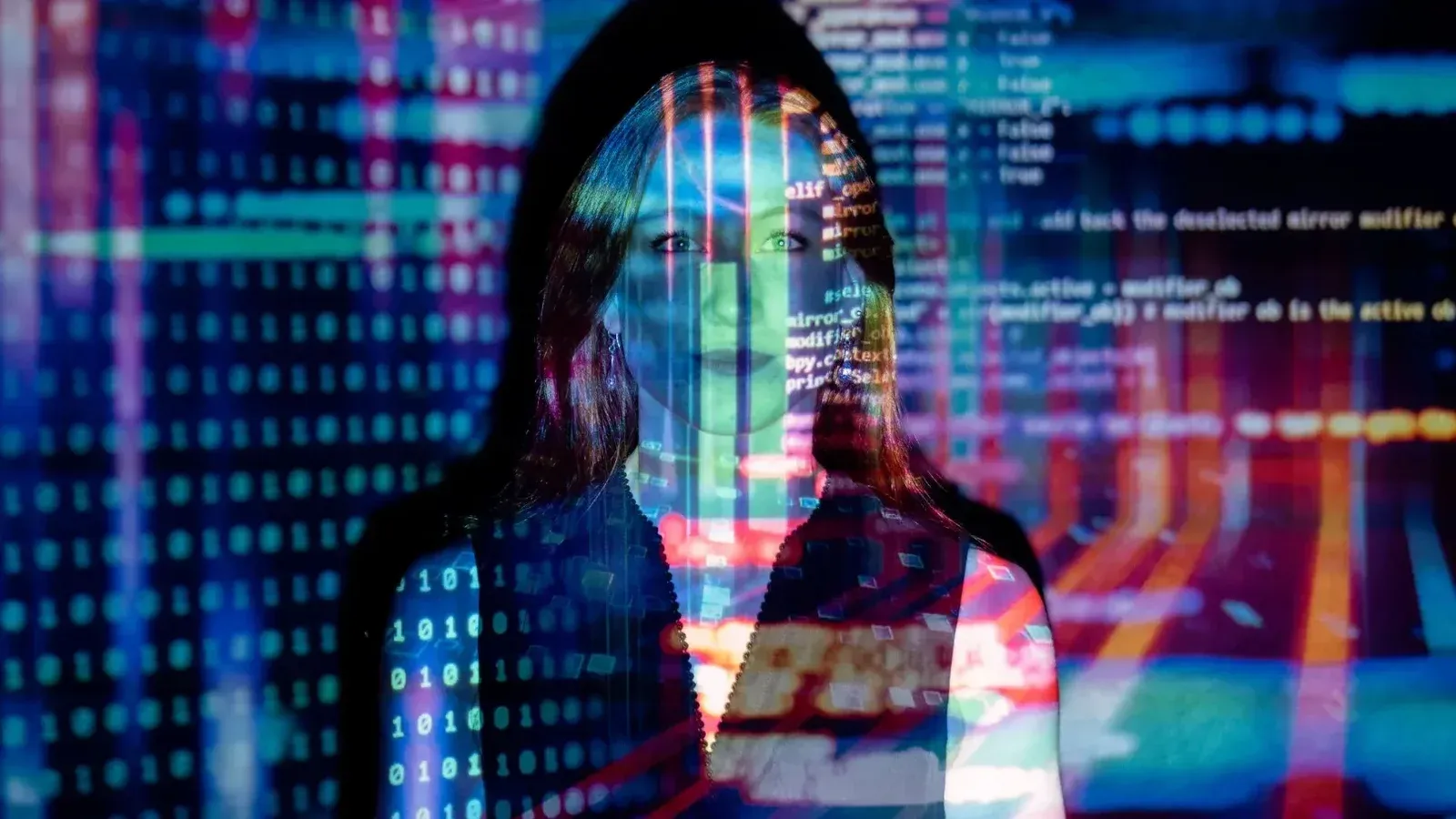 A woman with digital code projections on her face, representing technology and future concepts.