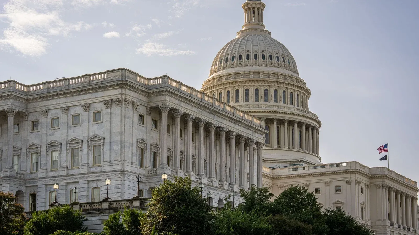 Stunning daytime view of the US Capitol Building in Washington DC, showcasing its architectural grandeur and iconic dome.