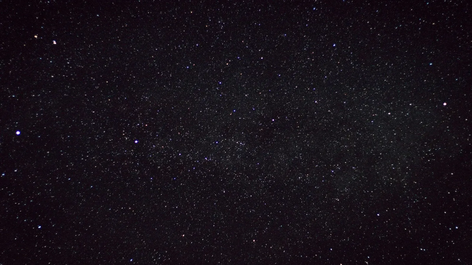 A clear starry night sky captured over the countryside in Germany, showcasing countless stars.