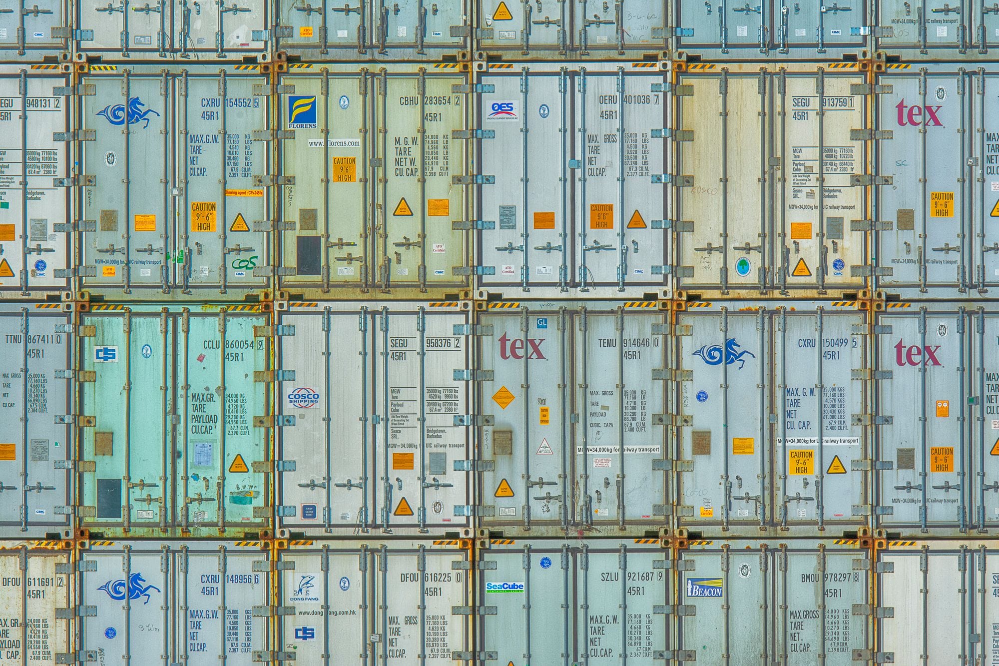 A vibrant display of stacked shipping containers, highlighting industrial organization.