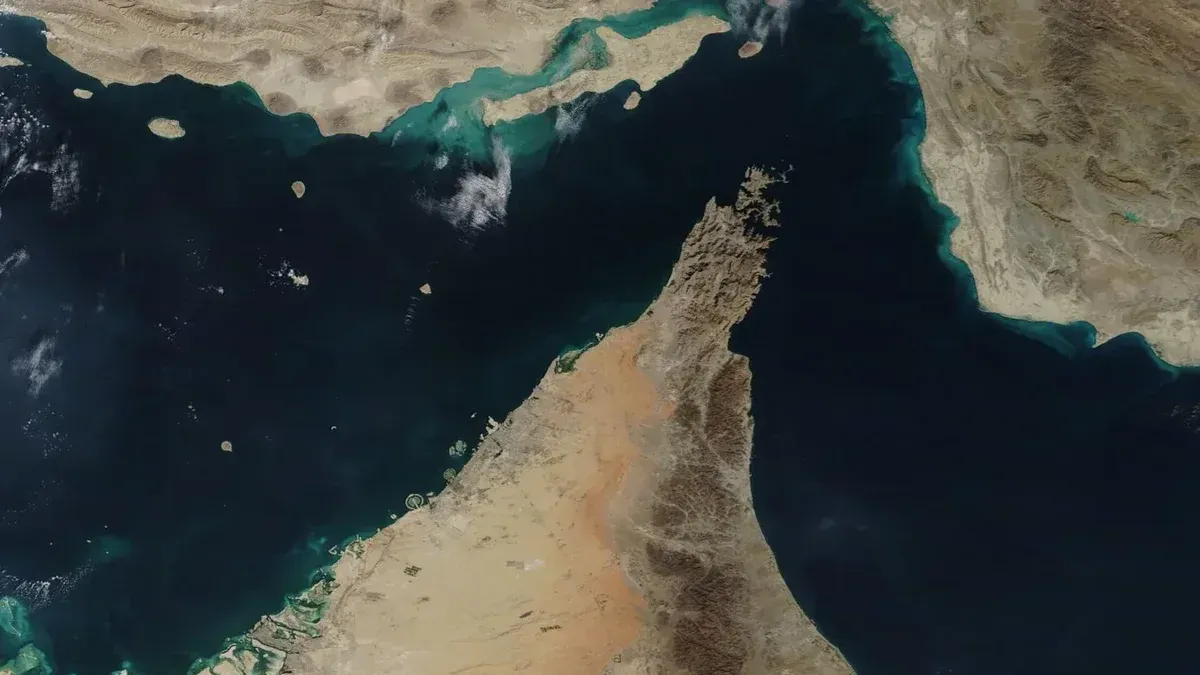 The narrow Strait of Hormuz lies between the Persian Gulf and the Gulf of Oman, separating Iran (north) from the Arabian Peninsula (south).