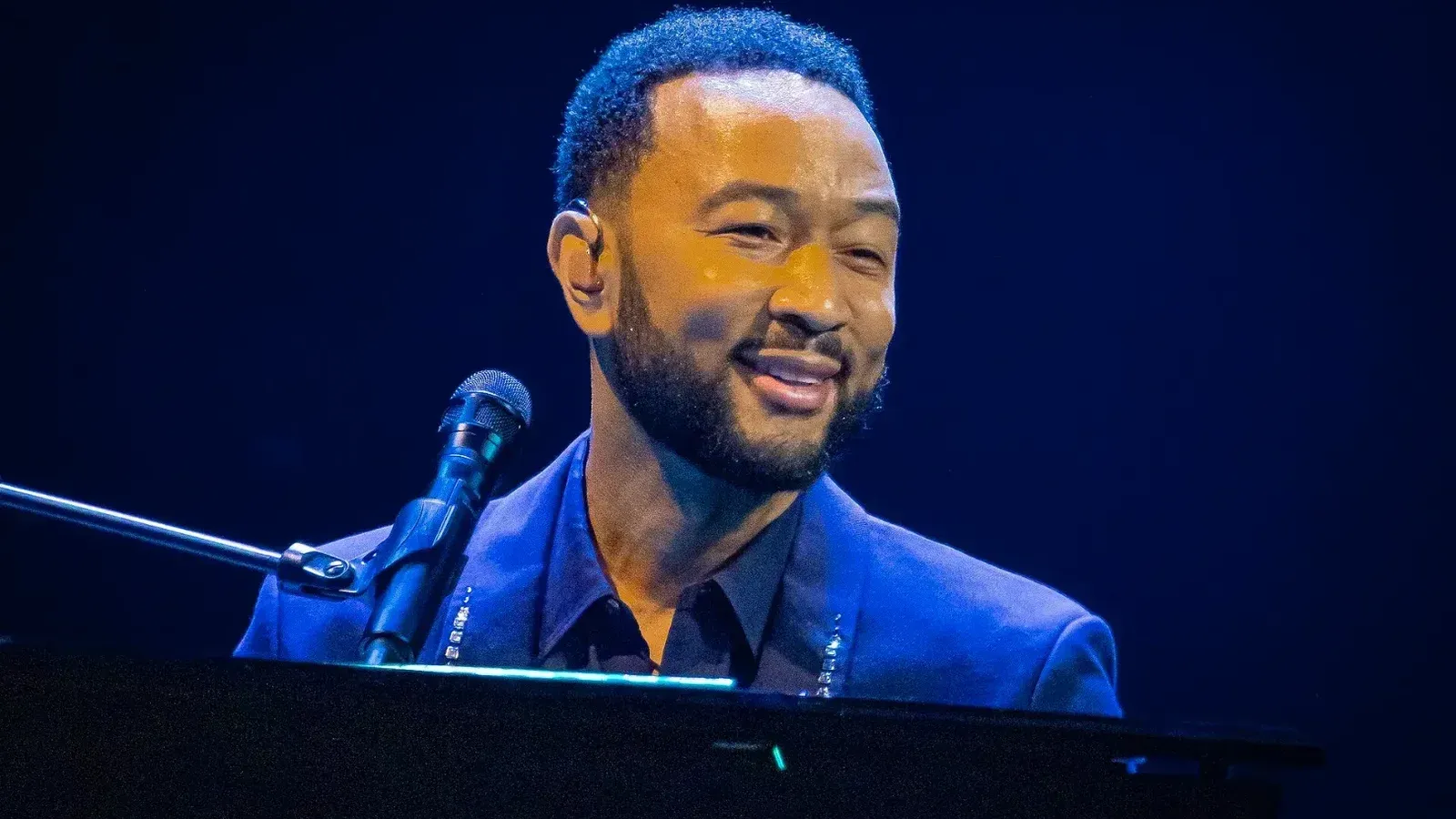 John Legend performing solo at the 60th Montreux Jazz Festival in 2026.