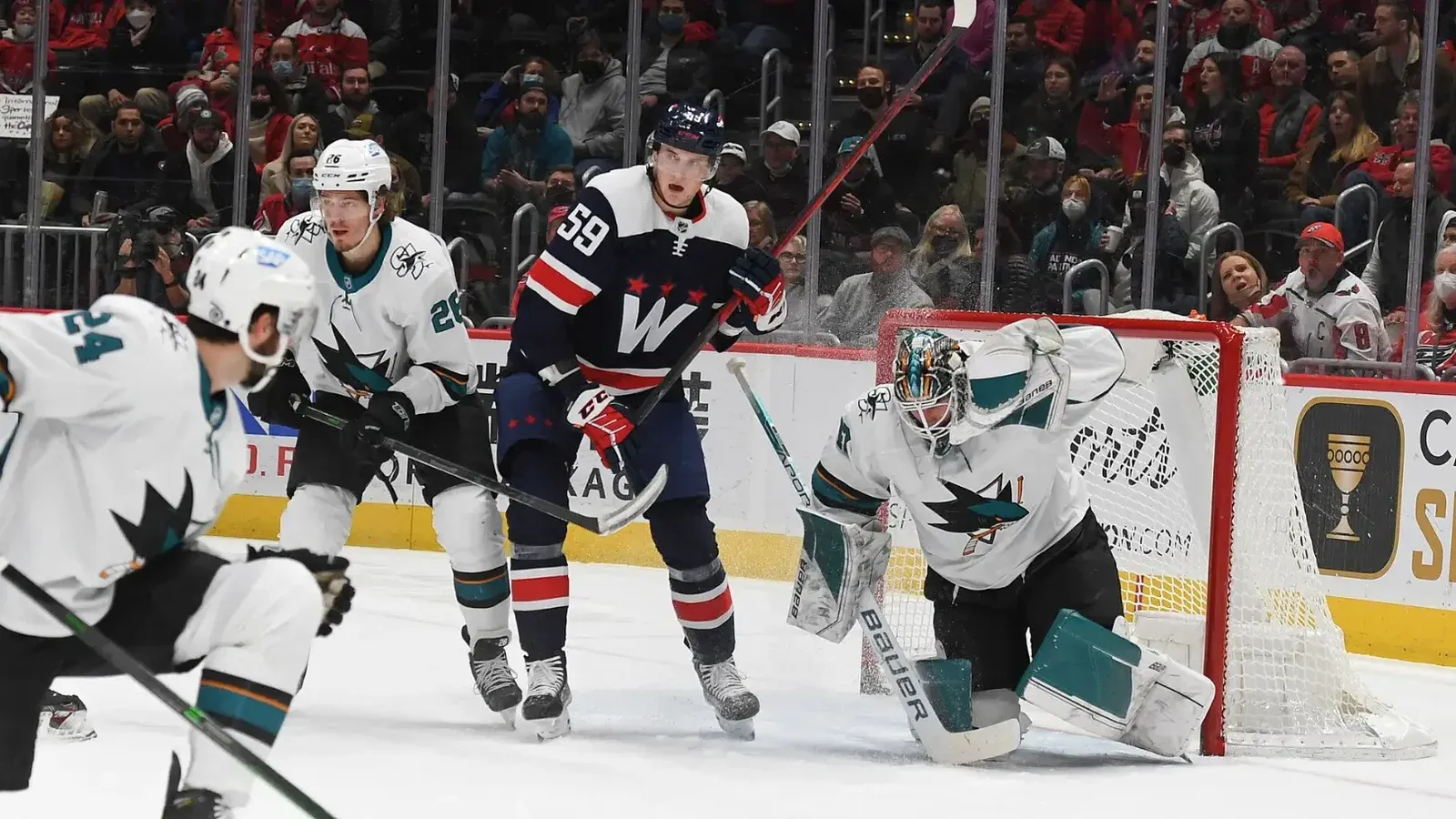 Washington Capitals Center Alexei Protas (59) looking to deflect the puck in front of the net during the 3rd period against the San Jose Sharks at Capital One Arena in Washington D.C