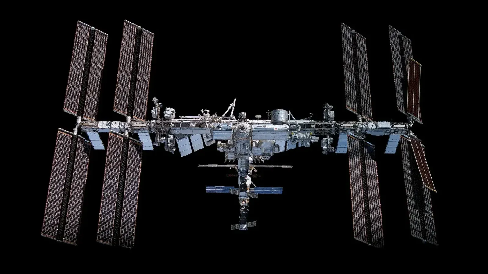 This mosaic depicts the International Space Station pictured from the SpaceX Crew Dragon Endeavour during a fly around of the orbiting lab that took place following its undocking from the