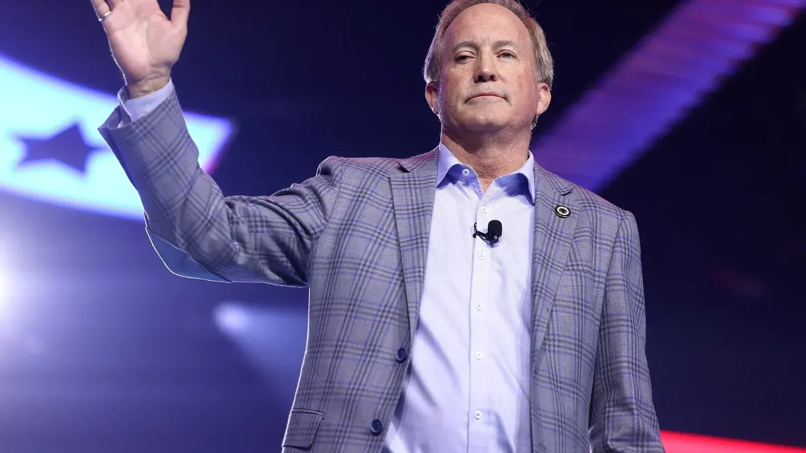 Texas Attorney General Ken Paxton speaking with attendees at the 2025 AmericaFest at the Phoenix Convention Center in Phoenix, Arizona.