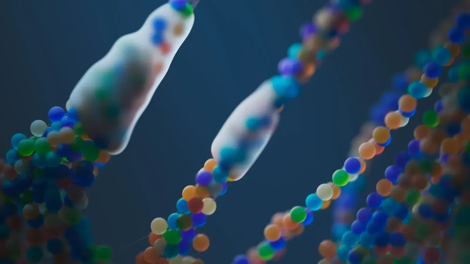 Close-up de una colorida representación abstracta de hebras de ADN, ilustrando la ciencia y la genética.