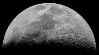 High-resolution monochrome image of the moon's surface showcasing craters and details.
