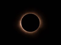 Stunning image of a total solar eclipse with glowing corona.