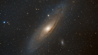 Stunning view of the Andromeda Galaxy surrounded by stars in the vast universe.