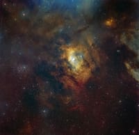 Captivating starscape featuring the Lagoon Nebula, showcasing cosmic clouds and interstellar dust in vivid detail.