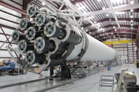 Low angle of innovative rocket core detail under construction at modern futuristic industrial factory