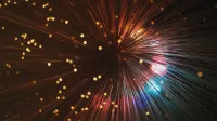From below of abstract backdrop representing many thin colorful vertical lines shining near small spots on black background