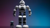 Close-up shot of two white robots displayed on a colorful gradient background symbolizing innovation in robotics.