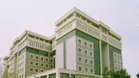 A modern multi-story courthouse building in Antalya, showcasing contemporary architecture.