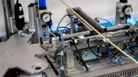 Close-up of advanced machinery showcasing robotic automation and precision engineering.
