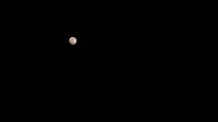 A full moon against a dark, starry night sky with no visible clouds.