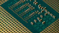 Detailed close-up of a microprocessor circuit board showcasing intricate circuitry and components.