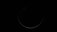 Stunning crescent view of Earth at night, highlighting city lights and vast oceans.