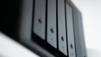 Detailed view of a black data storage unit highlighting modern technology and data management.