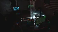 Team of cybersecurity experts collaboratively working on data protection in a dimly lit room filled with computers.