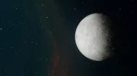 Detailed image of the moon's surface with a rich starry background in space.