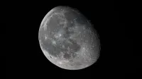 Detailed view of the moon's surface against a dark sky, captured in Florida.