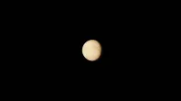 Image of planet Venus against a black space background, highlighting its atmospheric details.