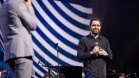 Austin Wintory speaking at the Game Developers Conference 2024.