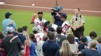 Ronald Acuña Jr., Ozzie Albies, Johan Camargo signing autographs