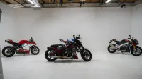 Three distinct motorcycles displayed in a white studio environment, showcasing their unique designs.