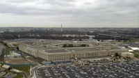 An aerial view of the headquarters of the United States Department of Defense located between the Potomac River and Arlington National Cemetery.