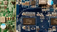 Detailed close-up of computer circuit boards highlighting electronic components and intricate circuitry.